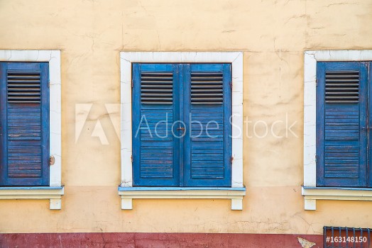 Image de Closed windows with old blue shutters Part of the facade of the building in the old town Riga Latvia